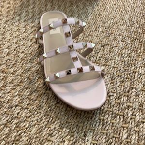 Light pink Valentino gladiator rock stud sandals.